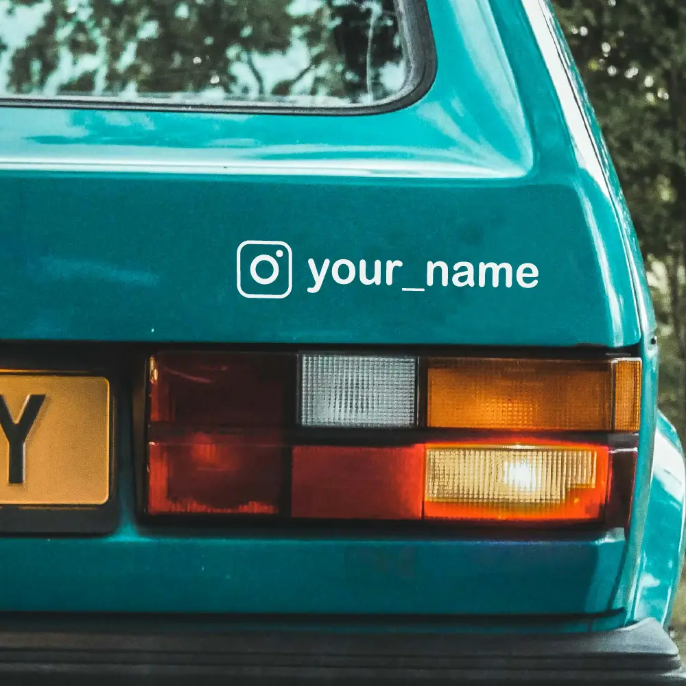 Camperprints Instagram sticker on the back of a car