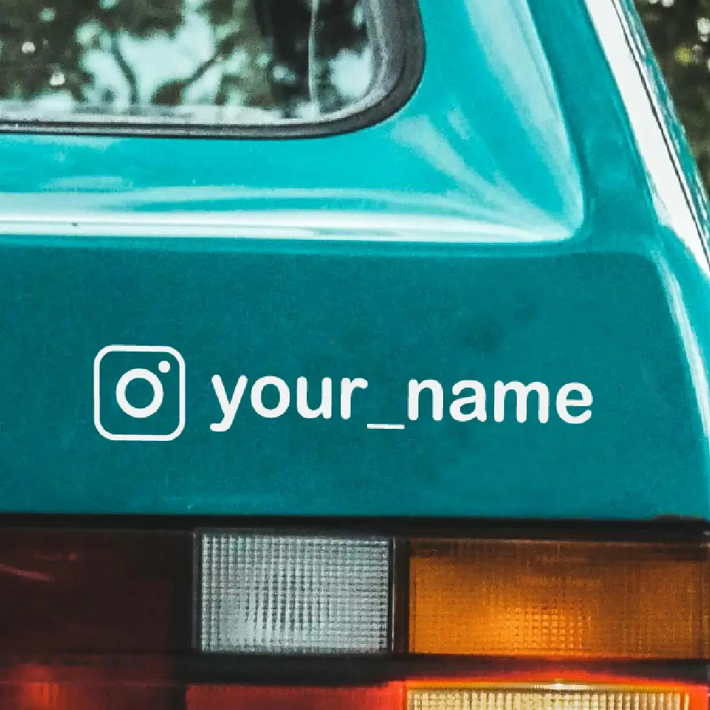 Camperprints Instagram sticker on the back of a car zoomed in