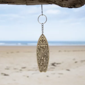 Keychain surfboard with an ethnic design.
