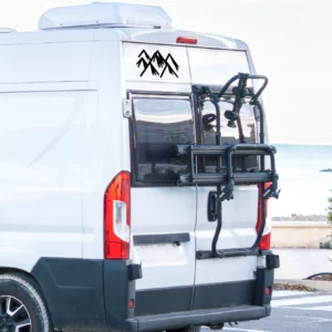 Mountain sticker camper on the back of a campervan.